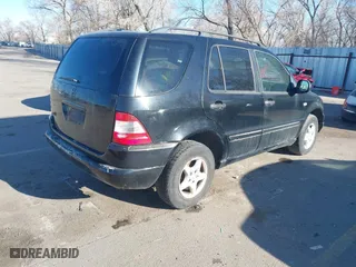2001 Mercedes-Benz M-Class with VIN 4JGAB54E31A269408, listed as a IAAI auction lot 41642163 with 1 mi miles. Bid and sale history available at carsss.com. Image 4.