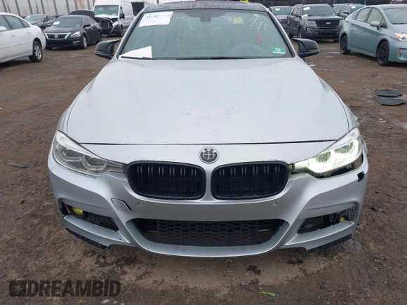2018 BMW 3 Series 330i xDrive with VIN WBA8D9C55JA607605, listed as a IAAI auction lot 41682994 with 79,285 mi miles and . Bid and sale history available at DreamBid. Image 12.