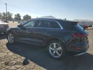 2019 Audi e-tron Premium Plus with VIN WA1LAAGE5KB023079, listed as a Copart auction lot 64977463 with 14,043 mi miles. Bid and sale history available at carsss.com. Image 2.