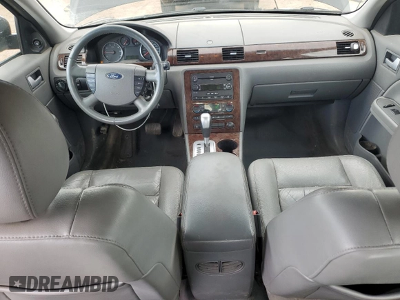 2007 Ford Five Hundred SEL z VIN 1FAFP24107G105360, wystawiony jako Copart lot #54726665 z przebiegiem 211 196 mil mil oraz Szkody całkowita. Historia ofert i sprzedaży dostępna na DreamBid. Obrazek 8.