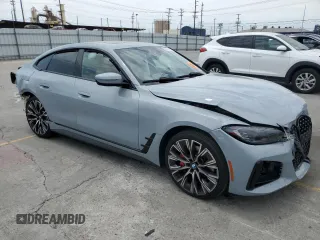 2022 BMW 4 Series 430i with VIN WBA63AV00NFM54895, listed as a Copart auction lot 59437215 with Not provided miles and Salvage title. Bid and sale history available at DreamBid. Image 4.