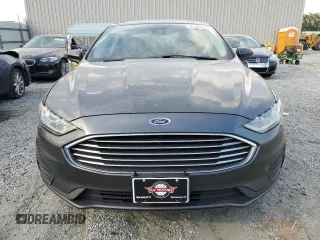2020 Ford Fusion SE with VIN 3FA6P0HD0LR184251, listed as a Copart auction lot 57325205 with 99,142 mi miles and Salvage title. Bid and sale history available at DreamBid. Image 5.
