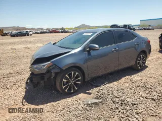2018 Toyota Corolla L z VIN 2T1BURHE6JC112701, wystawiony jako Copart lot #55699555 z przebiegiem 54 823 mil mil oraz Szkoda całkowita • Salvage title. Historia ofert i sprzedaży dostępna na DreamBid. Obrazek 1.