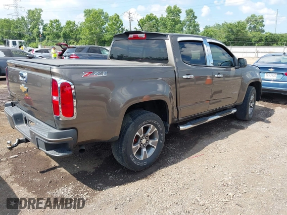 2015 Chevrolet Colorado 4WD Z71 with VIN 1GCGTCE38F1190708, listed as a IAAI auction lot 42686524 with 152,110 mi miles and . Bid and sale history available at DreamBid. Image 4.