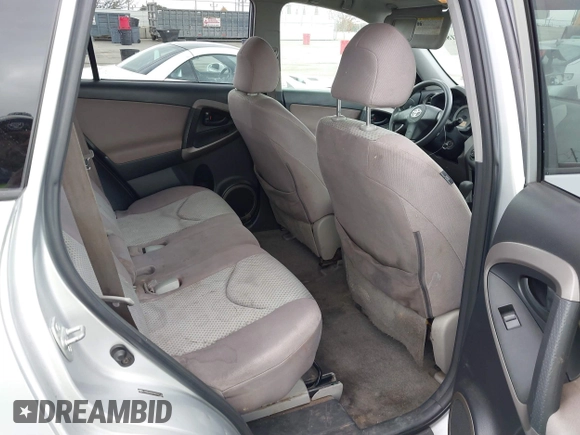 2006 Toyota RAV4 with VIN JTMZD33V965007142, listed as a IAAI auction lot 42117185 with 330,017 mi miles and . Bid and sale history available at DreamBid. Image 8.