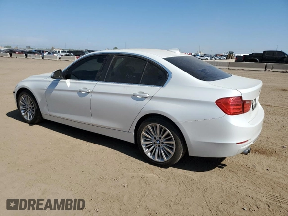 2013 BMW 3 Series 328i xDrive with VIN WBA3B3C51DF532714, listed as a Copart auction lot 57854735 with 140,650 mi miles and Salvage title. Bid and sale history available at DreamBid. Image 2.