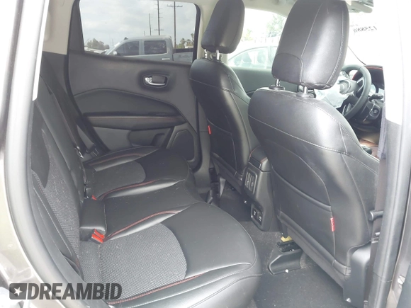 2021 Jeep Compass Trailhawk with VIN 3C4NJDDB6MT561074, listed as a IAAI auction lot 42125886 with 77,293 mi miles and . Bid and sale history available at DreamBid. Image 8.