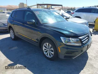 2018 Volkswagen Tiguan S with VIN 3VV1B7AX1JM165641, listed as a IAAI auction lot 42699622 with 75,354 mi miles and . Bid and sale history available at DreamBid. Image 1.
