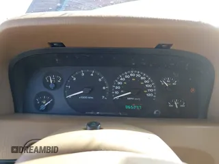 1999 Jeep Grand Cherokee Limited with VIN 1J4GW68N3XC770468, listed as a IAAI auction lot 41793600 with 65,277 mi miles. Bid and sale history available at carsss.com. Image 7.