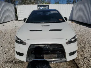 2015 Mitsubishi Lancer Evolution Final Edition z VIN JA32W7FV8FU028275, wystawiony jako Copart lot #77591623 z przebiegiem 44 124 mil mil oraz . Historia ofert i sprzedaży dostępna na DreamBid. Obrazek 5.