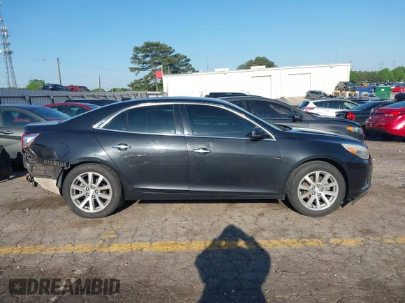 2014 Chevrolet Malibu LTZ with VIN 1G11H5SL9EF123813, listed as a IAAI auction lot 41984575 with 204,536 mi miles and . Bid and sale history available at DreamBid. Image 13.