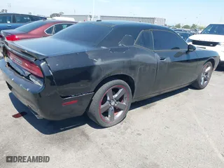 2013 Dodge Challenger SXT with VIN 2C3CDYAG9DH708717, listed as a IAAI auction lot 41990705 with 92,784 mi miles. Bid and sale history available at carsss.com. Image 4.