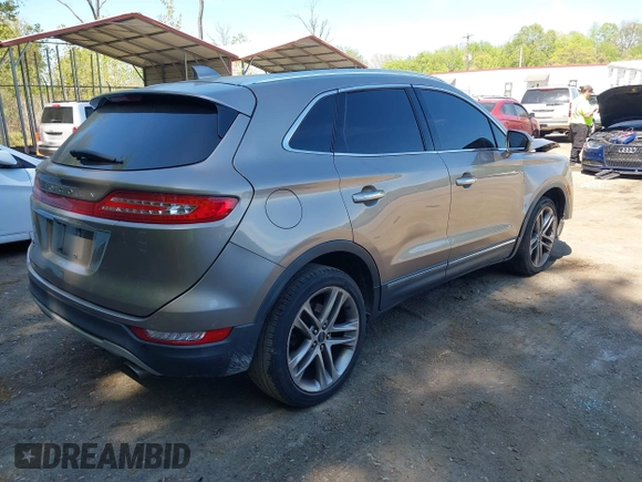 2019 Lincoln MKC Reserve with VIN 5LMCJ3D93KUL53163, listed as a IAAI auction lot 42097105 with 71,066 mi miles and . Bid and sale history available at DreamBid. Image 4.