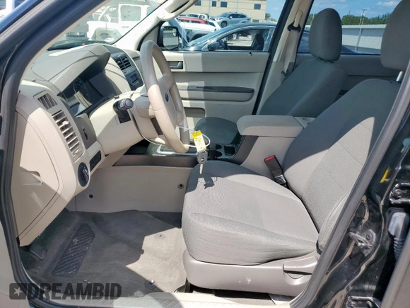 2012 Ford Escape XLS with VIN 1FMCU0C7XCKC81240, listed as a Copart auction lot 60207255 with 82,443 mi miles and Salvage title. Bid and sale history available at DreamBid. Image 7.