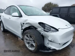 2022 Tesla Model Y Long Range with VIN 7SAYGDEE3NF380067, listed as a IAAI auction lot 41016704 with 52,180 mi miles and . Bid and sale history available at DreamBid. Image 6.
