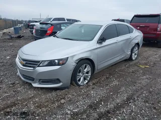 2015 Chevrolet Impala LT with VIN 1G1125S30FU138781, listed as a IAAI auction lot 41696424 with 150,239 mi miles. Bid and sale history available at carsss.com. Image 2.