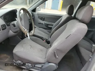 2003 Hyundai Accent GL with VIN KMHCG35CX3U270374, listed as a Copart auction lot 47240325 with 122,739 mi miles and Salvage Title. Bid and sale history available at carsss.com. Image 7.