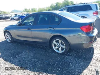 2014 BMW 3 Series 320i xDrive with VIN WBA3C3C54EP661409, listed as a IAAI auction lot 42182593 with 159,104 mi miles and . Bid and sale history available at DreamBid. Image 3.