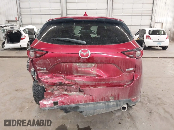 2018 Mazda CX-5 Grand Touring with VIN JM3KFBDM5J0414013, listed as a IAAI auction lot 42013479 with 88,225 mi miles and . Bid and sale history available at DreamBid. Image 17.