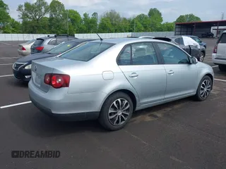 2008 Volkswagen Jetta S with VIN 3VWJZ71K38M088759, listed as a IAAI auction lot 42096924 with 110,320 mi miles and . Bid and sale history available at DreamBid. Image 4.