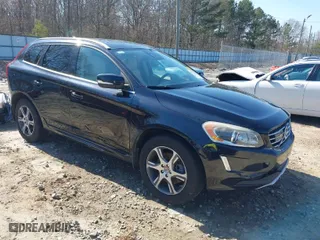 2015 Volvo XC60 T6 Drive-E Platinum with VIN YV449MDM5F2682413, listed as a IAAI auction lot 41791339 with 145,939 mi miles. Bid and sale history available at carsss.com. Image 1.