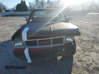 1982 GMC Sonoma z VIN 1GTCS14B0C8510847, wystawiony jako Copart lot #88016755 z przebiegiem 115 197 mil mil oraz Szkody całkowita. Historia ofert i sprzedaży dostępna na DreamBid. Obrazek 5.