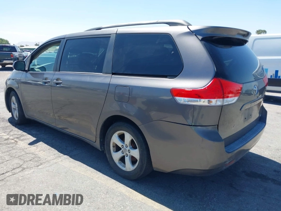 2011 Toyota Sienna LE AAS with VIN 5TDKK3DC4BS056872, listed as a IAAI auction lot 42643417 with 170,266 mi miles and . Bid and sale history available at DreamBid. Image 3.