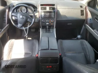 2014 Mazda CX-9 Grand Touring with VIN JM3TB3DV9E0444720, listed as a Copart auction lot 63687855 with 144,568 mi miles and Salvage title. Bid and sale history available at DreamBid. Image 8.