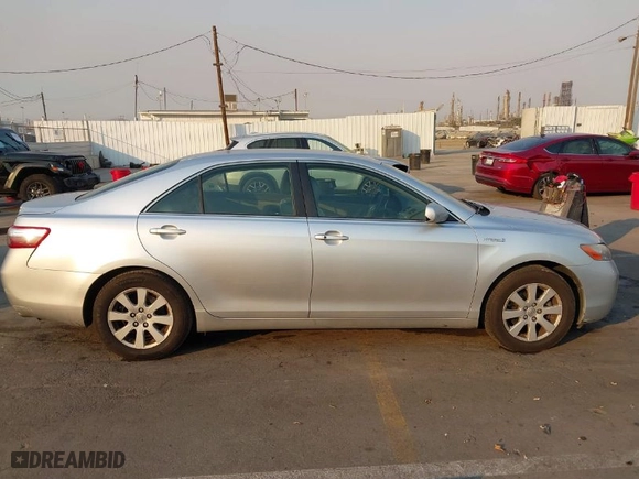 2007 Toyota Camry Hybrid with VIN JTNBB46K573027590, listed as a IAAI auction lot 41307314 with 159,168 mi miles. Bid and sale history available at carsss.com. Image 13.