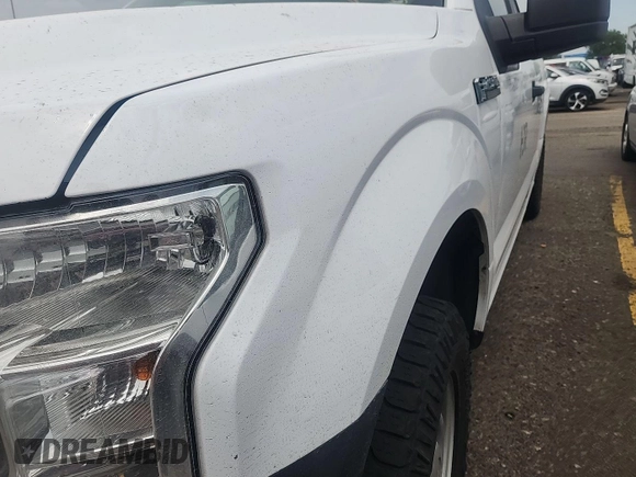 2017 Ford F-150 XL with VIN 1FTEX1E82HKD27618, listed as a IAAI auction lot 42796140 with 124,457 mi miles and . Bid and sale history available at DreamBid. Image 1.