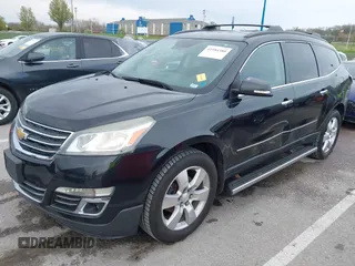 2014 Chevrolet Traverse LTZ with VIN 1GNKRJKD1EJ203282, listed as a IAAI auction lot 41984380 with 219,819 mi miles and . Bid and sale history available at DreamBid. Image 18.
