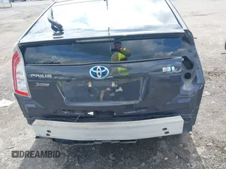 2014 Toyota Prius Four z VIN JTDKN3DUXE1816059, wystawiony jako IAAI lot #42268497 z przebiegiem 78 825 mil mil oraz . Historia ofert i sprzedaży dostępna na DreamBid. Obrazek 6.