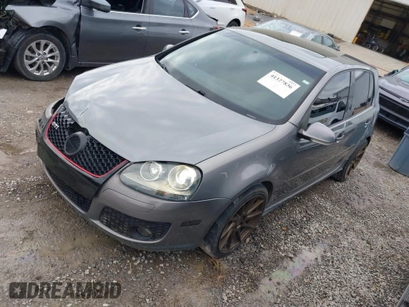 2009 Volkswagen GTI z VIN WVWHV71K79W109174, wystawiony jako IAAI lot #41327836 z przebiegiem 192 645 mil mil oraz . Historia ofert i sprzedaży dostępna na DreamBid. Obrazek 17.