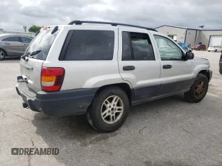 2004 Jeep Grand Cherokee Laredo z VIN 1J4GW48S14C288605, wystawiony jako Copart lot #60204815 z przebiegiem 247 816 mil mil oraz Szkoda całkowita • Salvage title. Historia ofert i sprzedaży dostępna na DreamBid. Obrazek 3.