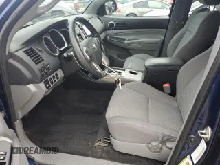 2015 Toyota Tacoma with VIN 3TMLU4EN6FM182144, listed as a Copart auction lot 64000365 with 185,361 mi miles and Clean title. Bid and sale history available at DreamBid. Image 7.