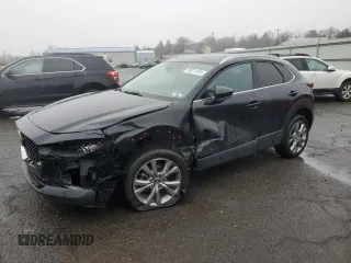 2021 Mazda CX-30 Premium with VIN 3MVDMBDL5MM300964, listed as a Copart auction lot 50311915 with 59,914 mi miles and Salvage Title. Bid and sale history available at carsss.com. Image 1.