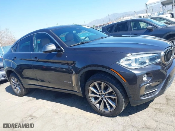 2017 BMW X6 sDrive35i with VIN 5UXKU0C34H0G69291, listed as a IAAI auction lot 41670871 with 73,977 mi miles. Bid and sale history available at carsss.com. Image 13.