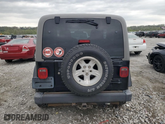 2004 Jeep Wrangler Sahara with VIN 1J4FA59SX4P713343, listed as a Copart auction lot 53608265 with 113,828 mi miles and Salvage title. Bid and sale history available at DreamBid. Image 6.