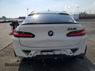 2022 BMW X4 M z VIN 5YM23EC01N9J82231, wystawiony jako Copart lot #43271695 z przebiegiem 20 715 mil mil oraz Szkody całkowita. Historia ofert i sprzedaży dostępna na DreamBid. Obrazek 6.