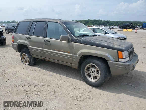 1996 Jeep Grand Cherokee Limited with VIN 1J4GZ78S3TC395758, listed as a Copart auction lot 60326205 with Not provided miles and Salvage title. Bid and sale history available at DreamBid. Image 4.