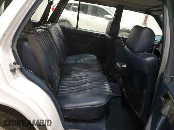 1987 Mercedes-Benz 300 with VIN WDBEB93D9HF036375, listed as a Copart auction lot 85326994 with 175,986 mi miles and Salvage Title. Bid and sale history available at DreamBid. Image 11.