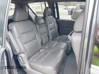 2010 Honda Odyssey EX-L with VIN 5FNRL3H68AB039883, listed as a IAAI auction lot 42000686 with 231,642 mi miles. Bid and sale history available at carsss.com. Image 8.