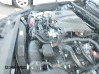 2025 Toyota Camry SE with VIN 4T1DAACK3SU592440, listed as a IAAI auction lot 43243159 with 7,671 mi miles and . Bid and sale history available at DreamBid. Image 18.