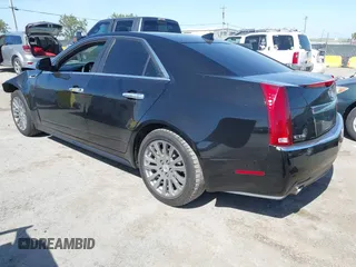 2012 Cadillac CTS Performance z VIN 1G6DJ5E30C0156576, wystawiony jako IAAI lot #42287858 z przebiegiem 106 497 mil mil oraz . Historia ofert i sprzedaży dostępna na DreamBid. Obrazek 3.