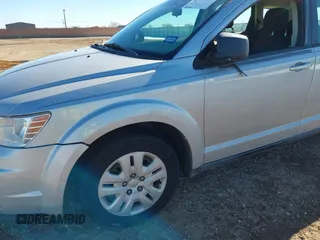 2014 Dodge Journey American Value Pkg with VIN 3C4PDCAB5ET119192, listed as a IAAI auction lot 41344250 with 228,461 mi miles. Bid and sale history available at carsss.com. Image 6.
