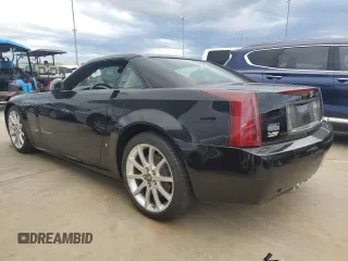 2006 Cadillac XLR z VIN 1G6YX36D465603297, wystawiony jako Copart lot #74231644 z przebiegiem Nie podano mil oraz Szkody całkowita. Historia ofert i sprzedaży dostępna na DreamBid. Obrazek 2.