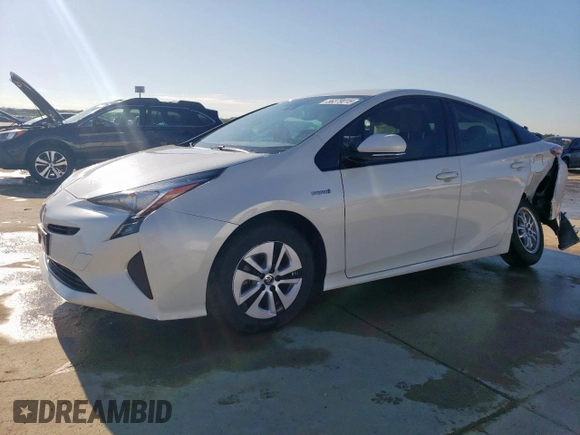 2017 Toyota Prius Two z VIN JTDKARFUXH3038947, wystawiony jako Copart lot #56379015 z przebiegiem 64 230 mil mil oraz Szkoda całkowita • Salvage title. Historia ofert i sprzedaży dostępna na DreamBid. Obrazek 1.