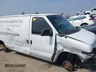 1999 Ford Econoline Cargo with VIN 1FTRE1421XHA35992, listed as a IAAI auction lot 42008448 with 293,689 mi miles and . Bid and sale history available at carsss.com. Image 6.