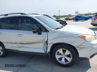2014 Subaru Forester Touring with VIN JF2SJAMC9EH497673, listed as a IAAI auction lot 42481068 with 174,882 mi miles and . Bid and sale history available at DreamBid. Image 6.