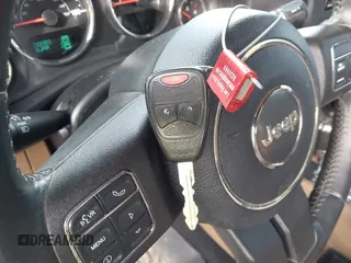 2016 Jeep Wrangler Unlimited 75th Anniversary with VIN 1C4BJWEG1GL221873, listed as a IAAI auction lot 41635788 with 148,493 mi miles. Bid and sale history available at carsss.com. Image 11.